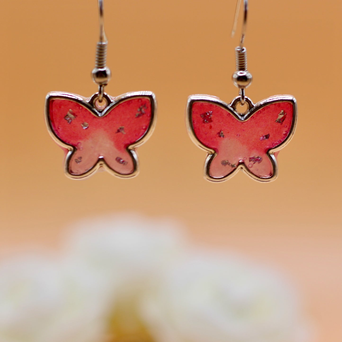 Oorbellen parelmoer roze vlinder