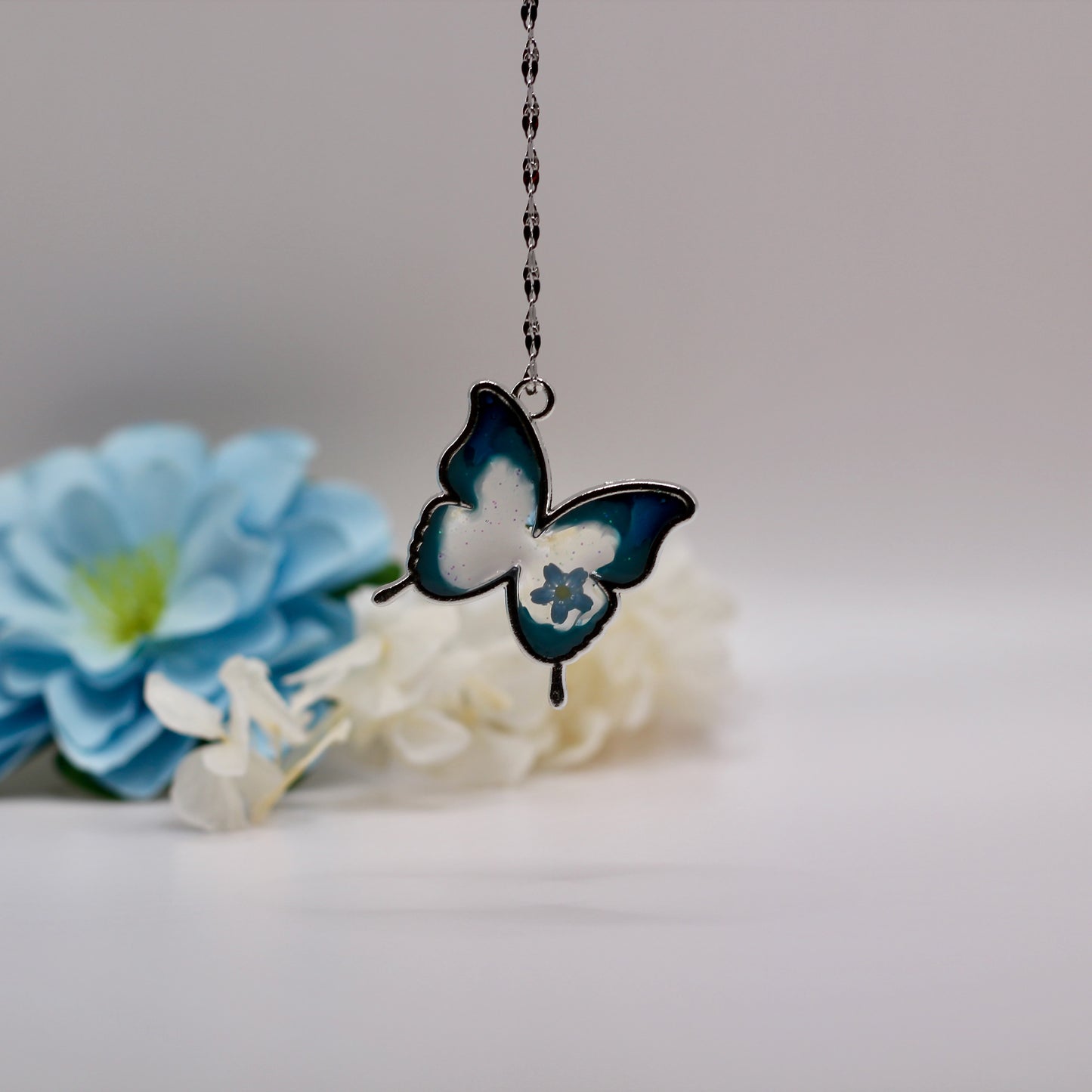 Ketting met robuuste vlinder transparant