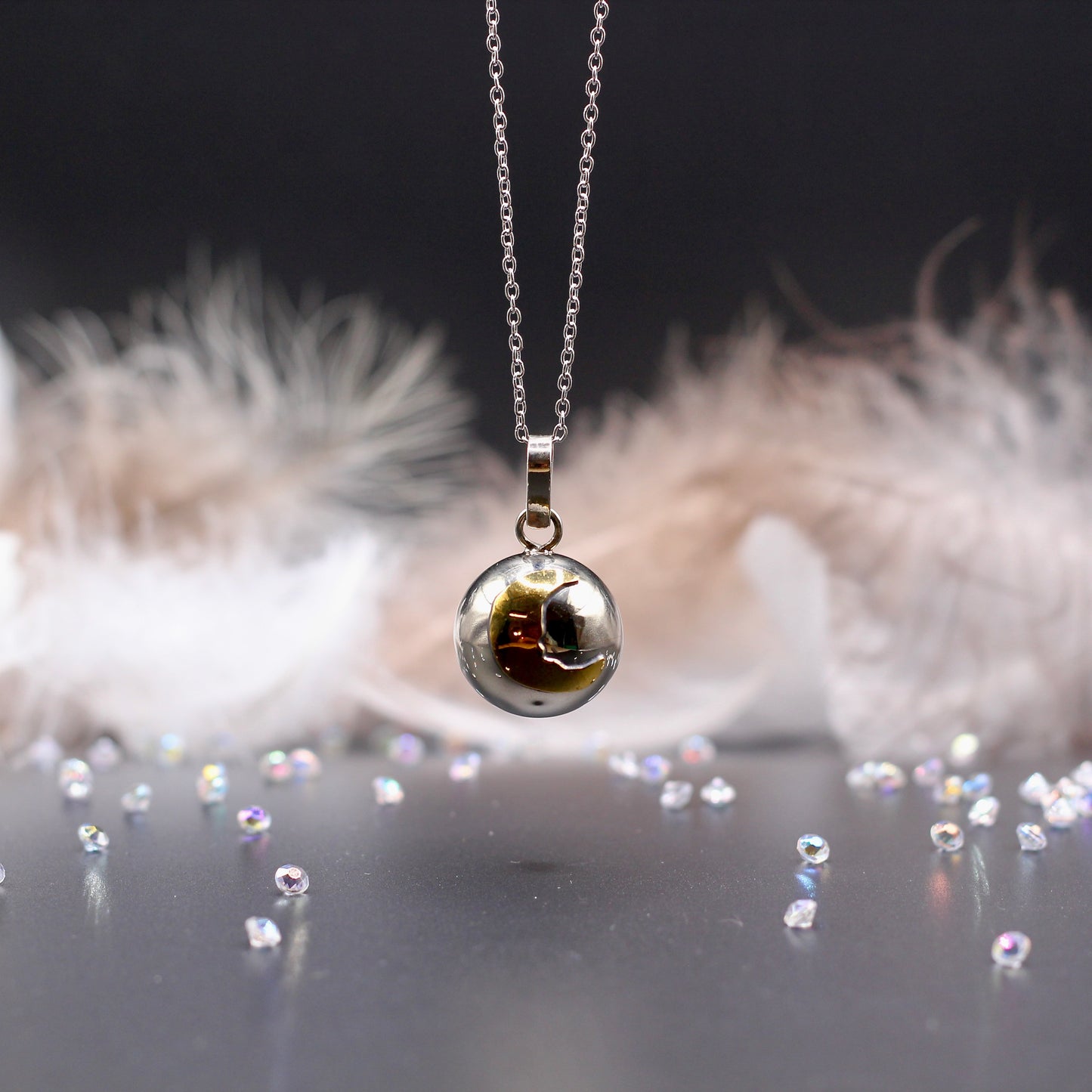 Ketting met muziekkogel zon en maan