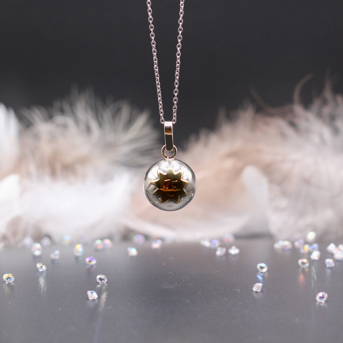 Ketting met muziekkogel zon en maan