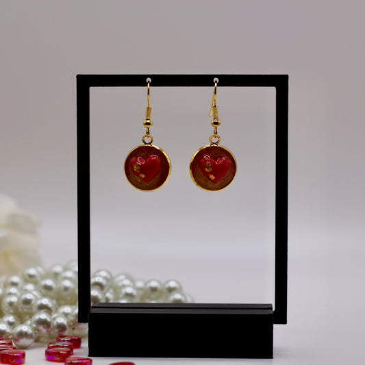 Oorbellen met bol hartje rood