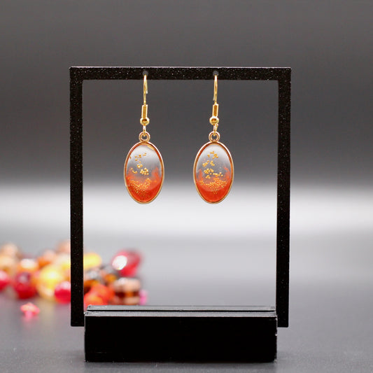 Oorbellen ovaal roest rood met goud